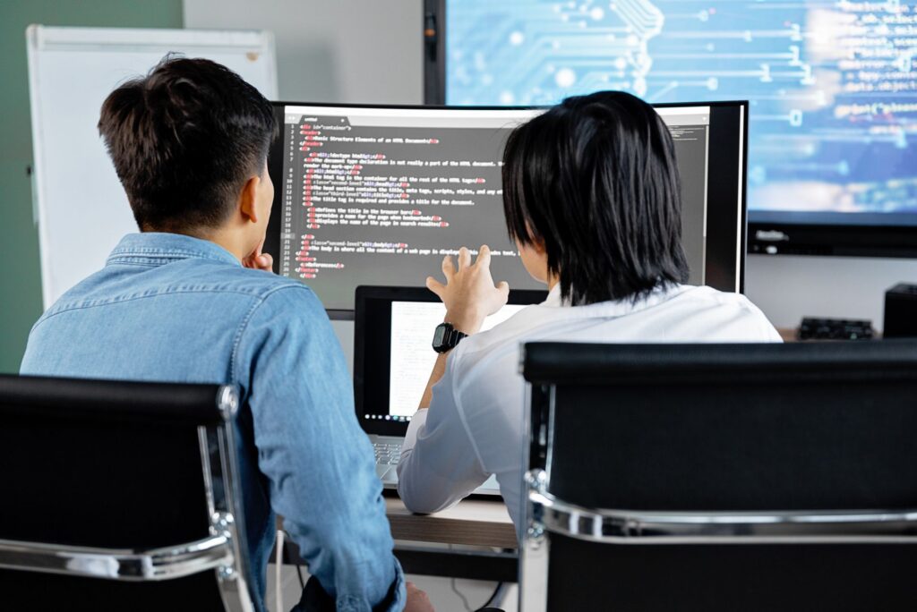 GenTec engineers working at monitoring screens