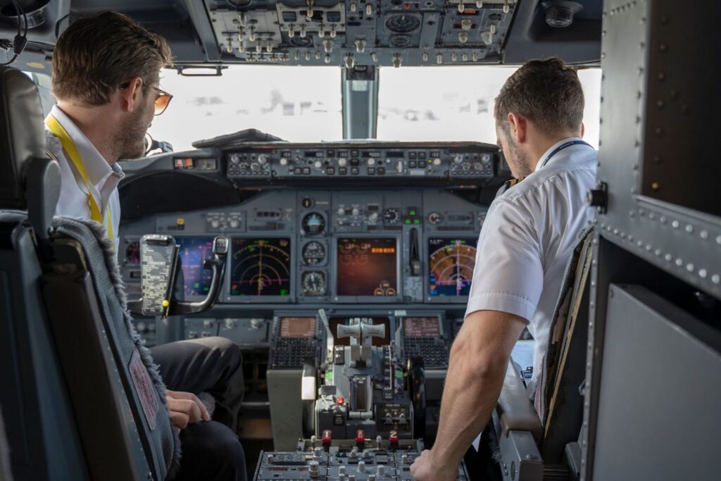 Pilots in an aircraft cockpit