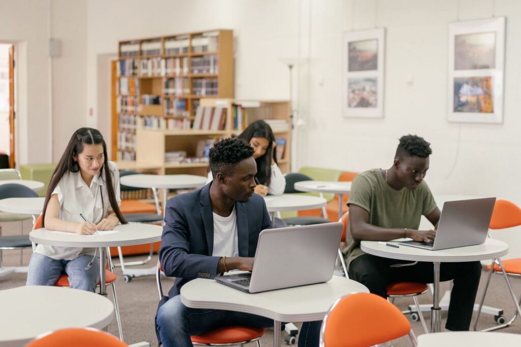 Teacher with students in a classroom