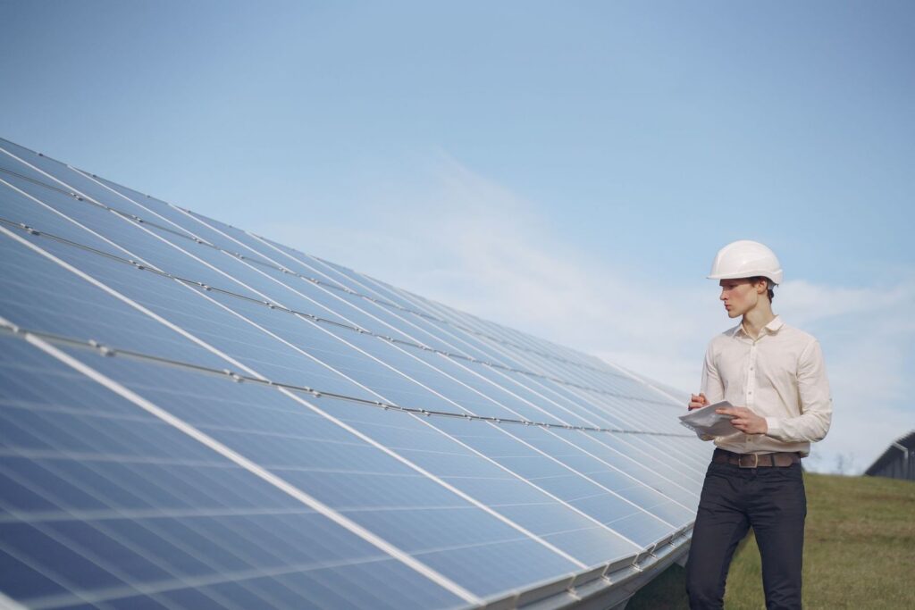 Engineer inspecting a solar installation