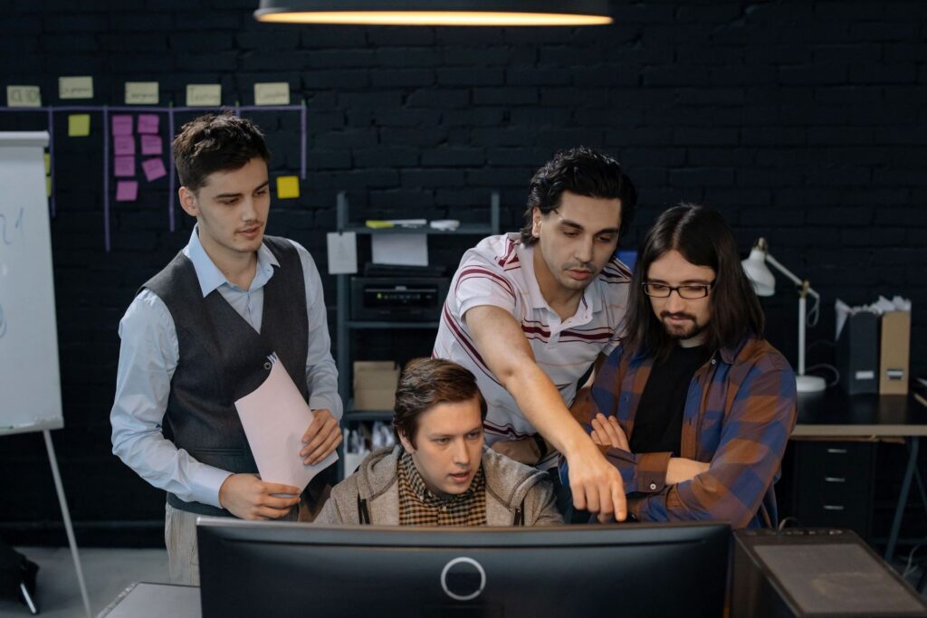 IT technician assisting an employee
