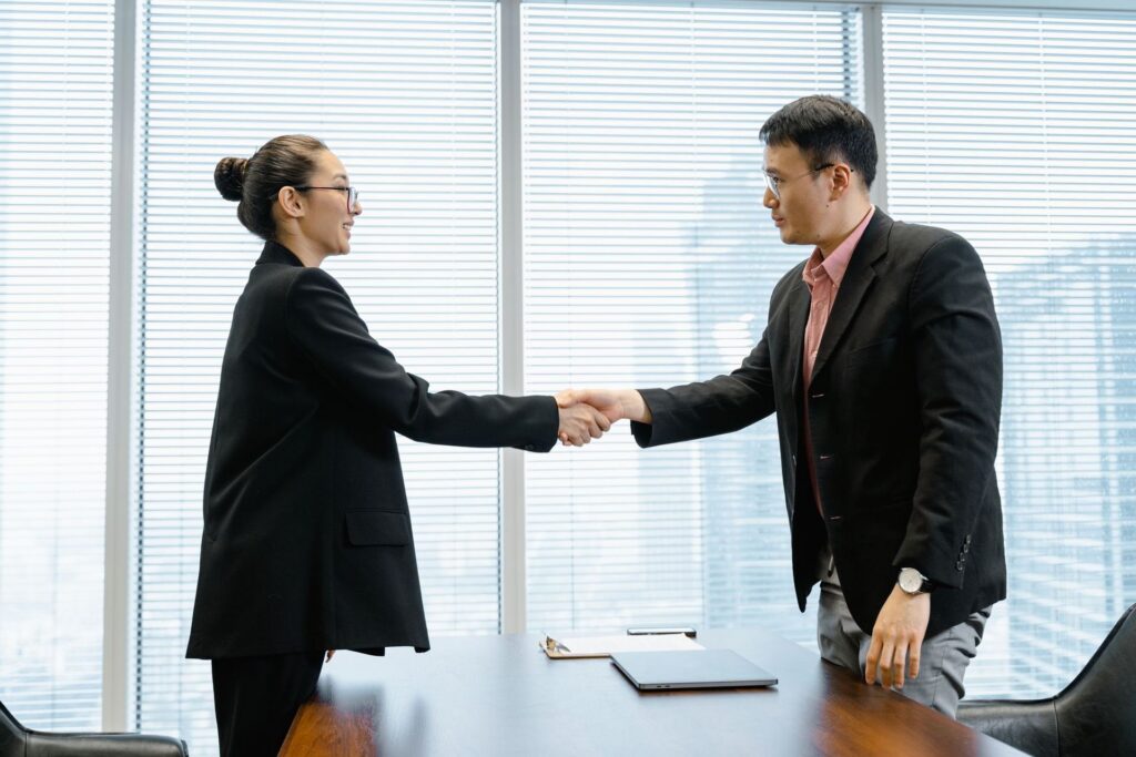 Business leaders shaking hands